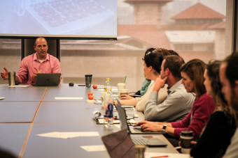 Michael Mackert, Ph.D. leading the steering committee meeting