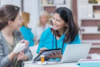 nurse and patient discussing medicine