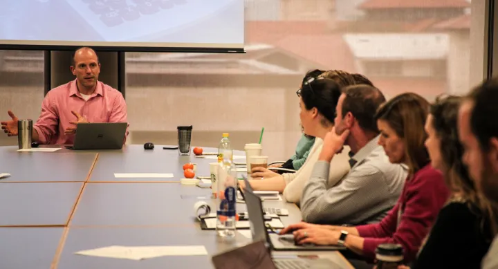 Michael Mackert, Ph.D. leading the steering committee meeting