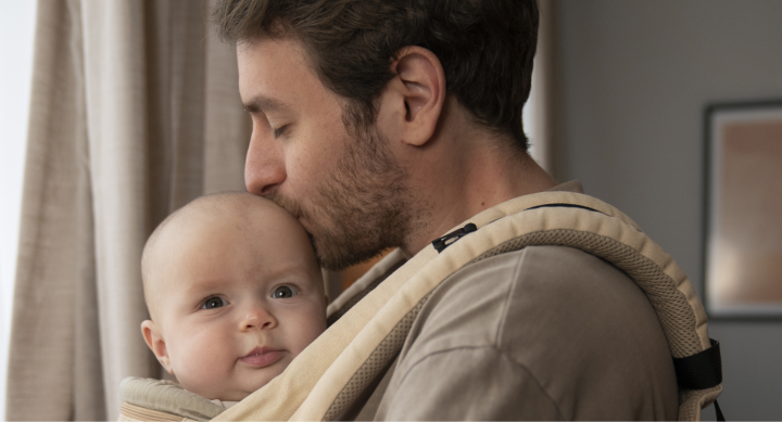 dad holding a baby